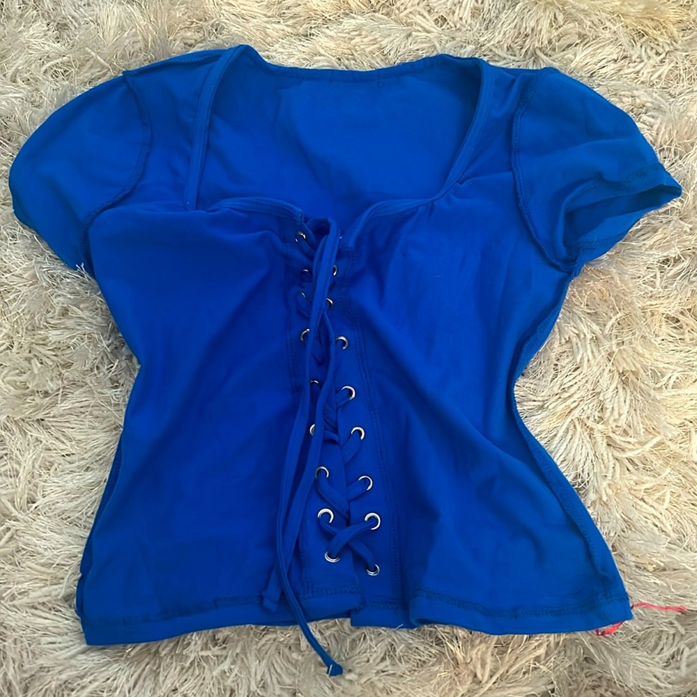 This is a blue shirt with ties so cute !